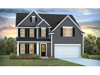 Two-story house with gray siding, white trim, and a two-car garage at 213 Bilge Rd, Ridgeville, SC 29472