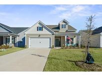 Two-story craftsman style home with a two car garage and landscaped lawn at 274 Tupelo Lake Dr, Summerville, SC 29486