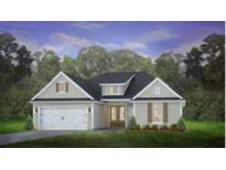 Two-story craftsman style home with a large front yard, white trim and gray siding at 207 Bilge Rd, Ridgeville, SC 29472