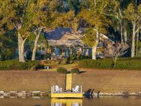 Stunning home with a large backyard, dock, and water view at 2281 Portside Way, Charleston, SC 29407