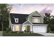Two-story house with green siding, white trim, and a two-car garage at 468 White Magnolia St, Moncks Corner, SC 29461