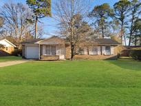 Brick ranch home with a large yard at 9812 Berrywood Dr, Ladson, SC 29456