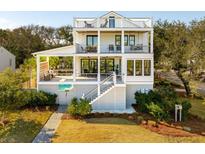 Two-story home with a large deck and ocean views at 2606 Cameron Blvd, Isle of Palms, SC 29451