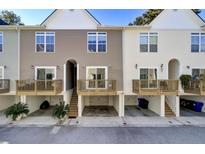 Three-unit townhouse building with private decks and garages at 1815 Dogwood Rd # 804, Charleston, SC 29414