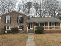 Brick home with new porch and landscaping at 2065 Bishop Dr, Charleston, SC 29414