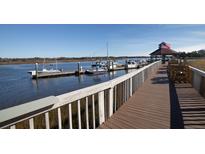 Wooden walkway leads to a charming gazebo and boat slips at 2323 Tall Sail Dr # F, Charleston, SC 29414