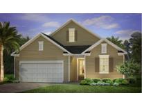 Two-story house with neutral siding, white garage door, and landscaping at 382 Willows Crescent Dr, Moncks Corner, SC 29461
