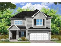 Two-story house with gray siding, white garage door, and landscaping at 1960 Central Ave, Summerville, SC 29483