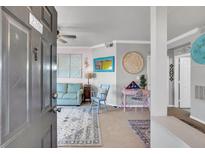 Inviting entryway with view of living room, featuring light-colored walls and stylish decor at 700 Daniel Ellis Dr # 2201, Charleston, SC 29412
