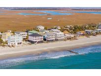 Aerial view of beach houses with oceanfront access at 1681 E Ashley Ave # A & B, Folly Beach, SC 29439