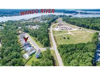 Aerial view of a house community near Wando River, featuring waterfront property and lush greenery at 714 Boatswain Dr, Charleston, SC 29492
