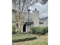 Attractive townhouse exterior with landscaping and a private entrance at 22 Maplecrest Dr, Charleston, SC 29412