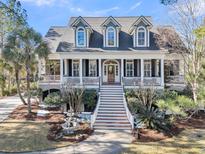 Two-story home with front porch and landscaping at 3715 Channel View Ct, Mount Pleasant, SC 29466