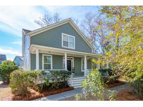 Charming Craftsman home with a welcoming front porch and landscaped yard at 1504 Galloway Ln, Charleston, SC 29412