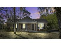 Charming brick ranch home with a well-manicured lawn at 21 Clearwater Dr, Goose Creek, SC 29445