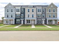 New townhome community with 5 units, neutral colors, and modern design at 220 Yorkshire Dr # 1, Moncks Corner, SC 29461