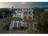 Luxury beachfront home with expansive decks and ocean views at 4001 Palm Blvd, Isle of Palms, SC 29451