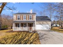 Two-story house with attached garage and lawn at 407 Burton Ave, Summerville, SC 29485