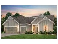 Two-story house with gray siding, two car garage, and landscaped lawn at 1180 Island Preserve Rd, Johns Island, SC 29455