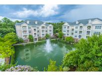 Aerial view of apartment community with pond and fountain at 2244 Ashley Crossing Dr # 333, Charleston, SC 29414
