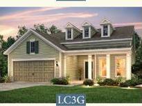 Charming two-story home with front porch and landscaped yard at 4322 Hugh Bennett Dr, Johns Island, SC 29455
