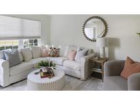 Bright living room with comfy sectional sofa and stylish coffee table at 519 Parkdale Dr # J, Charleston, SC 29414