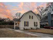 Charming cape cod style home with a landscaped yard at 922 Billfish Ct, Charleston, SC 29412