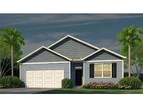 Charming one-story home with white garage door and blue siding at 2263 Macallan Blvd, Ravenel, SC 29470