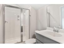 Clean bathroom with shower and gray vanity at 558 Richfield Way, Summerville, SC 29486