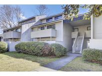 Tan multi-unit building with balconies and landscaping at 702 Greenmeadow Dr, Goose Creek, SC 29445