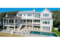 Luxury home with pool and expansive deck; two-story design at 2302 Palm Blvd, Isle of Palms, SC 29451