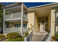 Two-story condo building with balconies and a walkway at 2311 Tall Sail Dr # B, Charleston, SC 29414