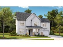 Two-story home with gray shingle roof, white siding, and brick accents at 569 Richfield Way, Summerville, SC 29486