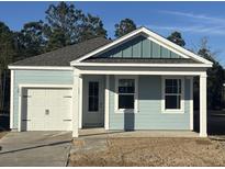 Charming craftsman style home with a light blue exterior, white trim, and a two-car garage at 116 Lilac Grove Way, Summerville, SC 29486