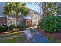 Attractive building exterior with landscaping and walkway at 188 Midland Pkwy # 205, Summerville, SC 29485