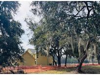 New two-story craftsman style home with a covered porch and board and batten siding at 2976 Lodge Berry Ln, Johns Island, SC 29455