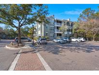 Gray building with ample parking and landscaping at 1632 Telfair Way, Charleston, SC 29412
