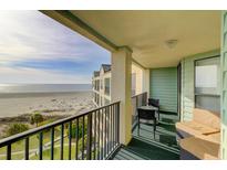 Ocean view balcony with seating for relaxing and enjoying the coastal breeze at 8000 Palmetto Dr # 505, Isle of Palms, SC 29451