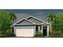 Charming one story home featuring a two-car garage and tropical landscaping at 286 Watersglen Dr, Summerville, SC 29486