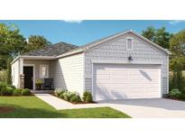 Charming single-story home featuring a two-car garage, stone accents, and manicured landscaping at 206 Pine Crest View Dr, Summerville, SC 29486