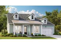 Charming one-story home with light-green siding, dormer windows and a welcoming covered porch at 214 Denham St, Summerville, SC 29486