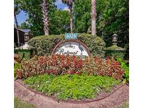 Community entrance sign with landscaped shrubbery and trees at The Retreat At Seabrook, South Carolina at 1025 Riverland Woods Pl # 608, Charleston, SC 29412