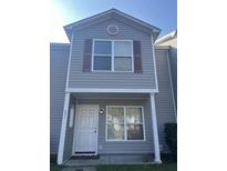 Charming two-story home showcasing a welcoming front door and neutral siding at 531 Travelers Blvd, Summerville, SC 29485