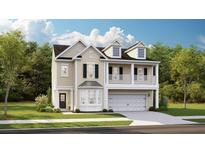 Charming two-story home with a welcoming front porch, a bay window, and a two-car garage at 608 Red Monarch Way, Moncks Corner, SC 29461
