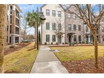 Charming townhomes with sidewalks, mature trees, and well-manicured lawns in a walkable neighborhood at 1510 Martel St, Mount Pleasant, SC 29464