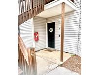 Inviting entryway with a black door, wreath, and the unit number displayed prominently at 11 Rudwick Cir, Goose Creek, SC 29445