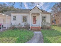 Charming single-Gathering home with a quaint front porch and mature landscaping at 2181 Edisto Ave, Charleston, SC 29412