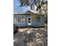 Charming single-story building featuring a blue painted exterior and a well-maintained front yard at 2157 Dorchester Rd, North Charleston, SC 29405
