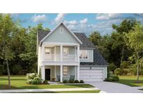 Charming two-story home with front porch, manicured lawn, attached garage, and lush surrounding trees at 1844 Nola Run, Summerville, SC 29485