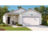 Charming single-story home with a two-car garage and inviting front porch at 301 Pine Crest View Dr, Summerville, SC 29486